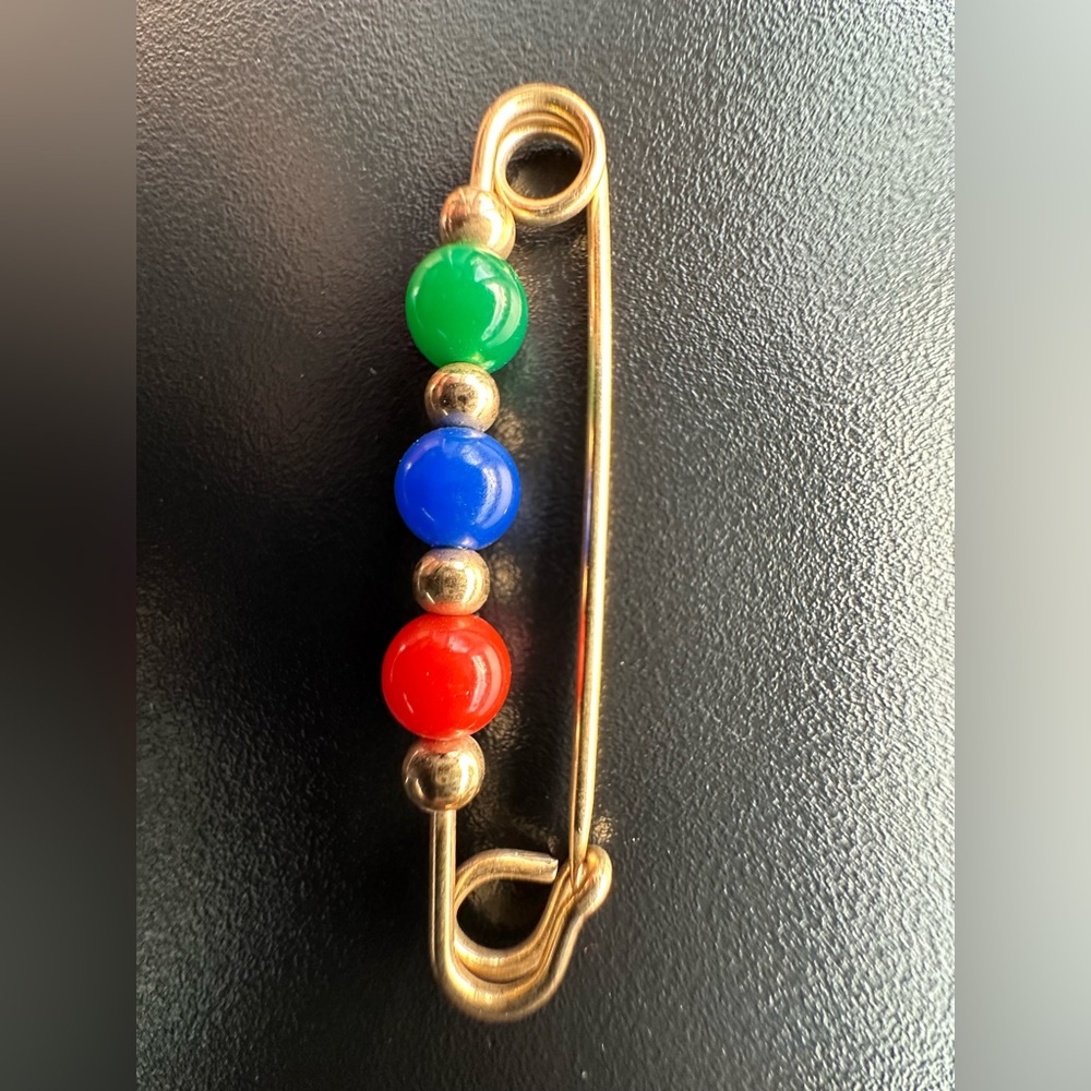 Vintage Avon gold-tone safety pin brooch